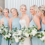 Textured chignon wedding and bridal hair and classic makeup