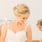 Textured chignon wedding and bridal hair and classic makeup