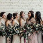 Boho soft wedding style with classic bold yet natural makeup, braided updos for bridal party, half up half down